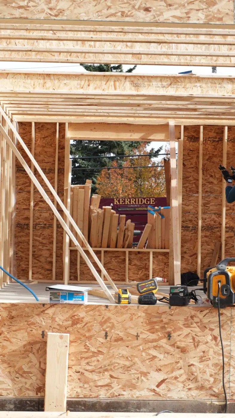 Framed window opening with exterior sheathing on a Calgary build